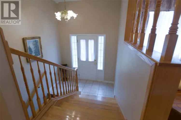 2-Apartment Home with Hardwood Floors and Wood Stove