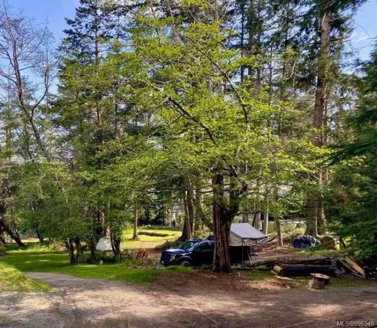 062 Acre Property with 3 Bay Workshop and Ocean Glimpses