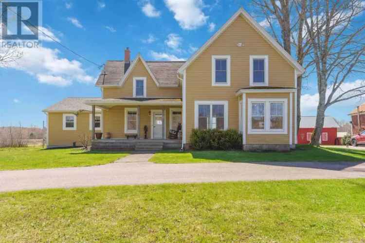 18.5-Acre Country Retreat Farmhouse with Pool and Outbuildings