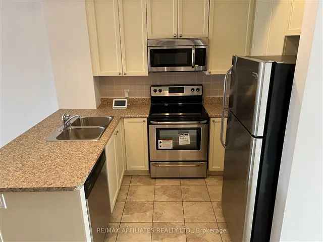 Vacant 1299 Sq Ft Condo with Balcony, Island Kitchen and Parking