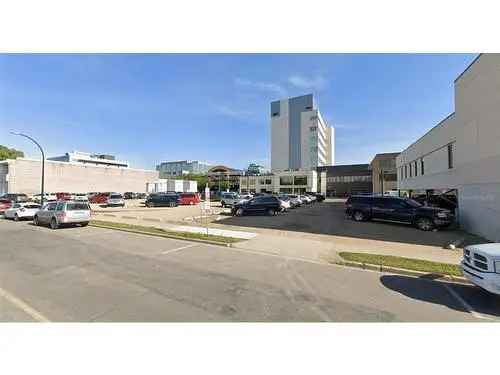 Buy Commercial Property in Downtown Red Deer with Development Opportunity