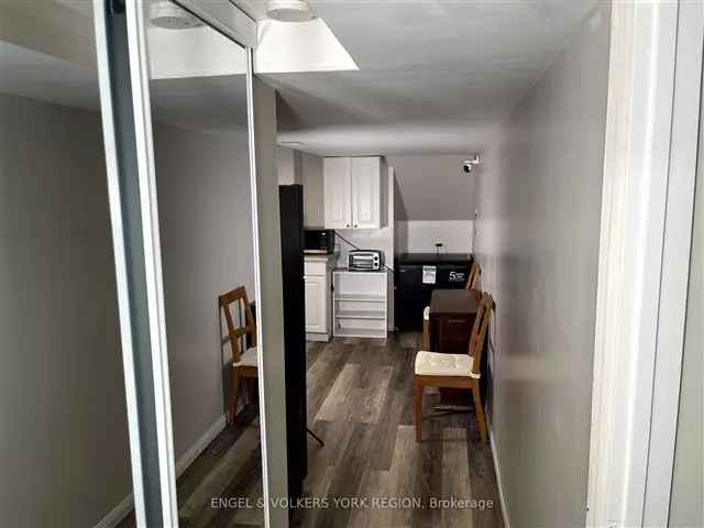 Charming Furnished 2-Bedroom Basement Apartment Near Transit