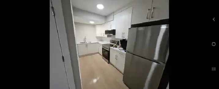 1 Bedroom + Den Basement Suite in Carrington NW