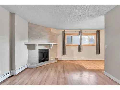 Buy Condo in Crescent Heights Calgary Featuring 2 Bedrooms and Parking