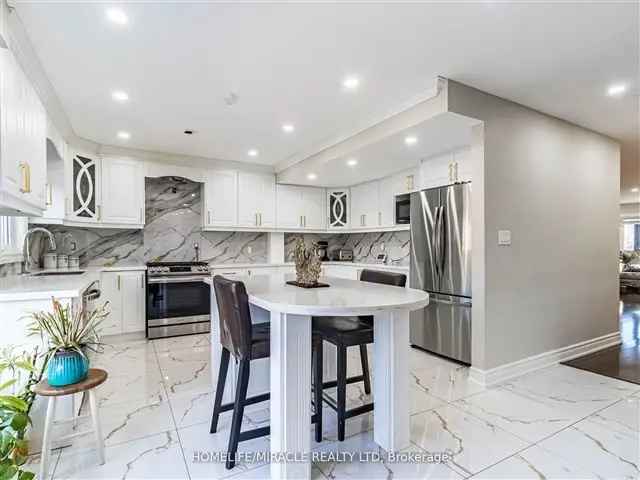 Fully Renovated 4-Bedroom Detached Home with Legal Basement Apartment