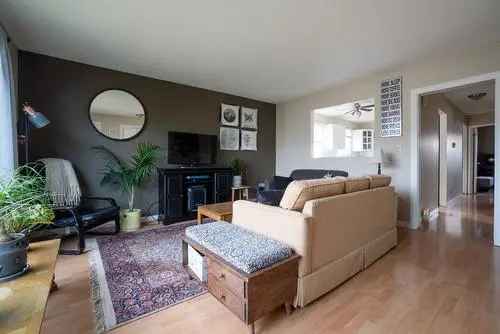 Buy House in Kelowna with Renovated Suite and Detached Shop