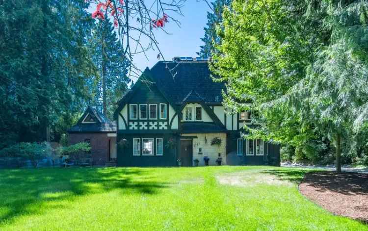 Buy Tudor style manor in prime Kerrisdale location with 7 bedrooms and garden