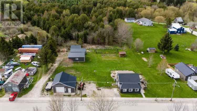 Formosa Home with 07 Acres and Multiple Outbuildings