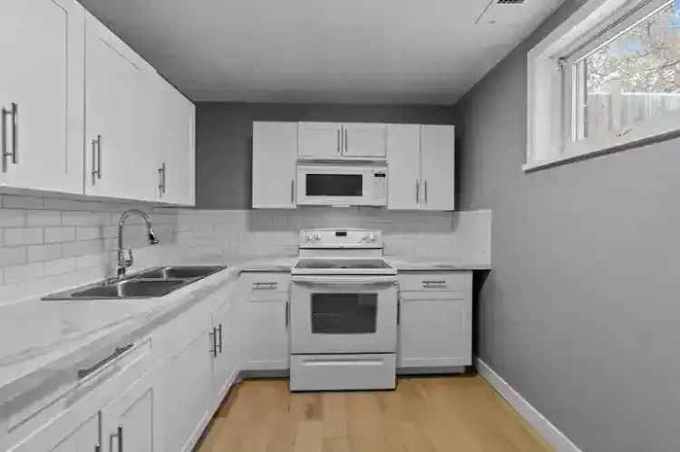 Rent Triplex in Camrose with 2 Separate Units and Pet Friendly Features