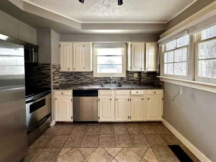 2-Storey Character Home with Redevelopment Potential