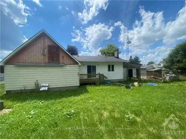 Saint Pascal-Baylon Fixer-Upper 2 Bed 1 Bath Home 03 Acres