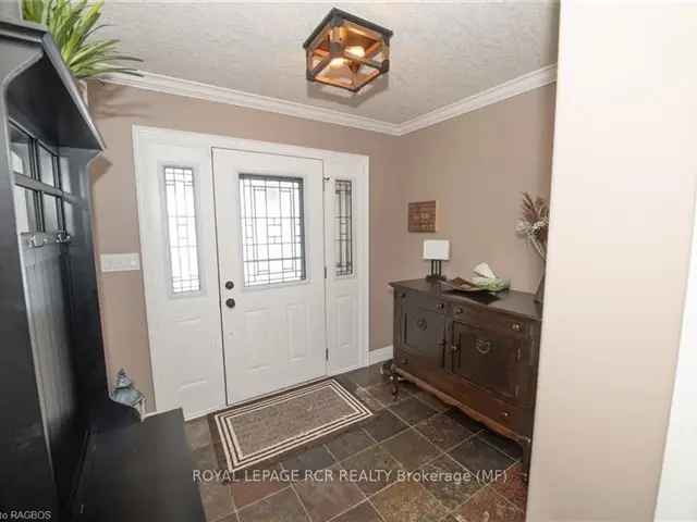 Spacious Custom Bungalow with Open Concept Layout and Many Updates