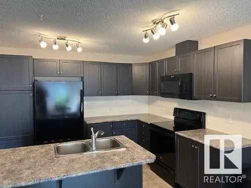 Condo for Sale in Rutherford Edmonton with 2 Bedrooms and Parking