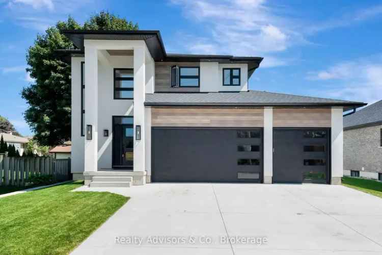 Modern Home with Open Concept Main Level and Luxurious Suite