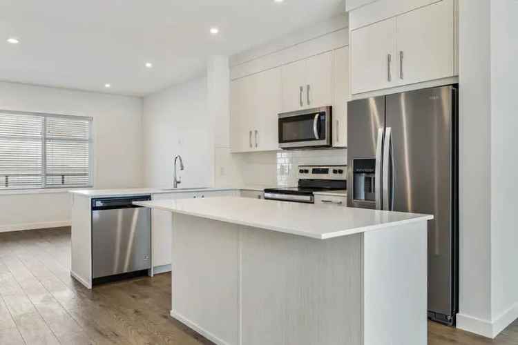 Buy 4 Bedroom Townhomes in Belmont Calgary with Modern Features