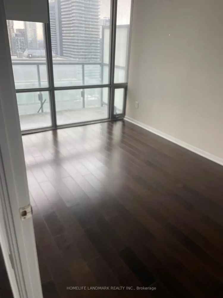 Rent 2 Bedroom Apartment in Downtown Toronto with Balcony and High Ceilings