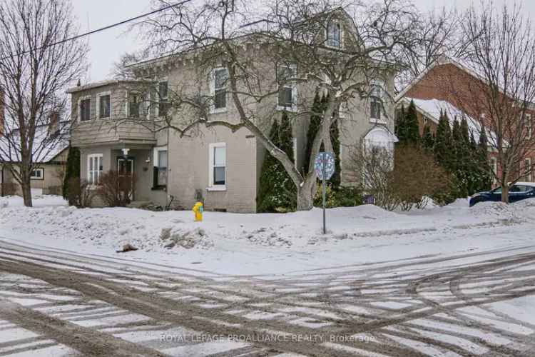 Fourplex for sale in Belleville with rental income and character features