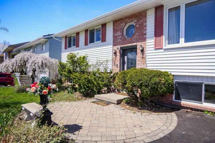 Spacious Raised Bungalow with 4 Bedrooms and Large Backyard