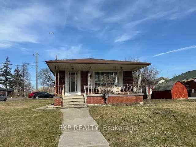 Large Corner Lot with Cozy Brick Bungalow Near Jane and Wilson