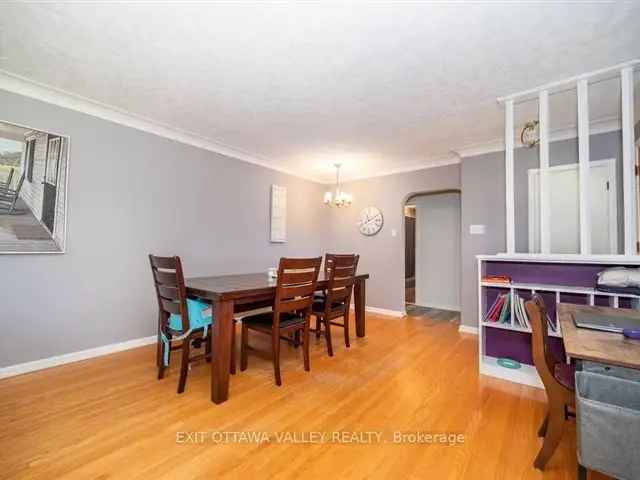 Spacious 3-Bedroom Bungalow with Sunroom and Fireplace