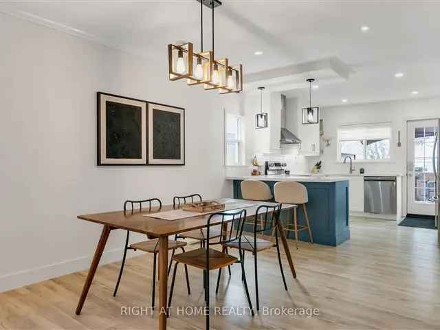 Renovated Open Concept Home with Double Garage and West-Facing Deck