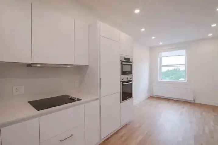 Rent Renovated Apartment in Cote-des-Neiges with Balcony and Modern Features