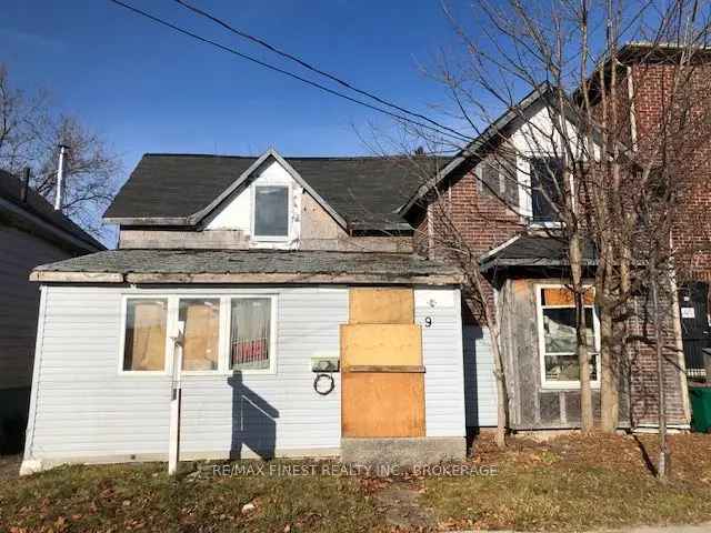 Buy House in Growing Neighborhood Near Rideau Canal with Refurbishment Potential