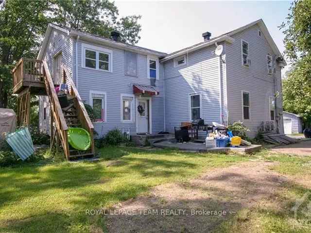 3-Unit Apartment Building with Waterfront Garage