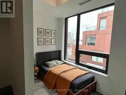 1 Bedroom + Den Corner Suite in Toronto's Corktown