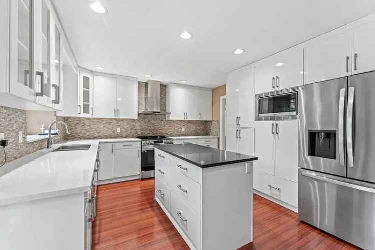 5 Bed 3 Bath House with Legal Suite R3 Zoning South Surrey