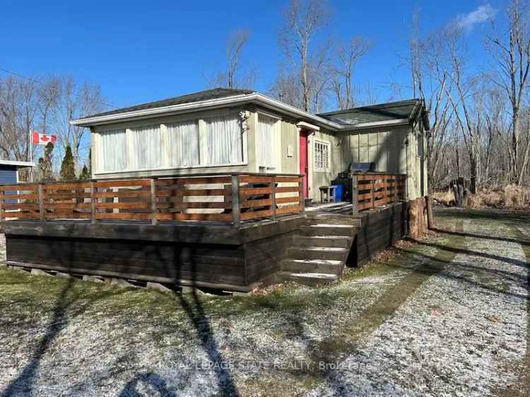 Cozy cottage for sale near Sandy Bay Road featuring water views