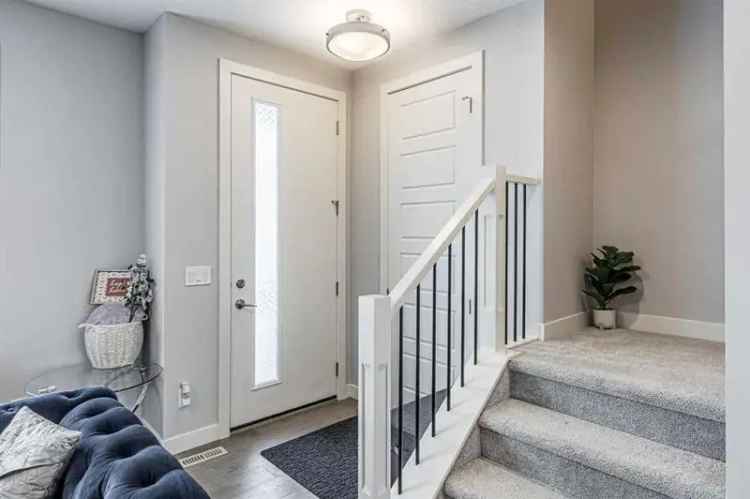 Buy Townhome in Creekside with Modern Design and No Condo Fees