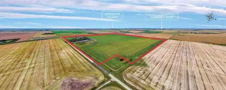 Development Land for Sale with Two Houses East of Balzac AB