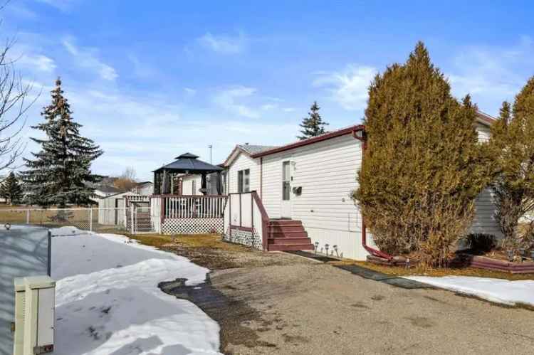 Buy mobile home with spacious deck and gazebo in a beautifully renovated setting