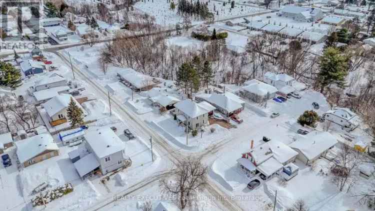 Buy Victorian-inspired two-storey home in Sturgeon Falls with backyard