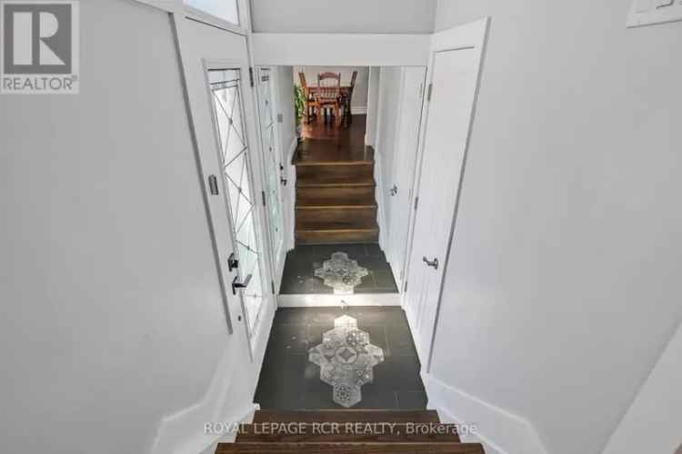 Renovated Home with Legal Basement Apartment Near Amenities