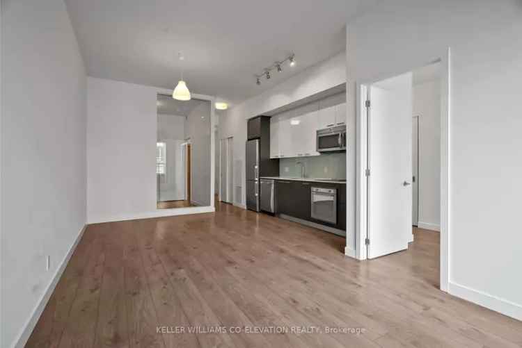 Leslieville 2-Bedroom Suite with Modern Finishes and Rooftop Terrace