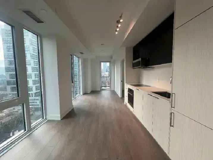 Rent 2 Bedroom Condo Corner Unit in Toronto with Den and Parking