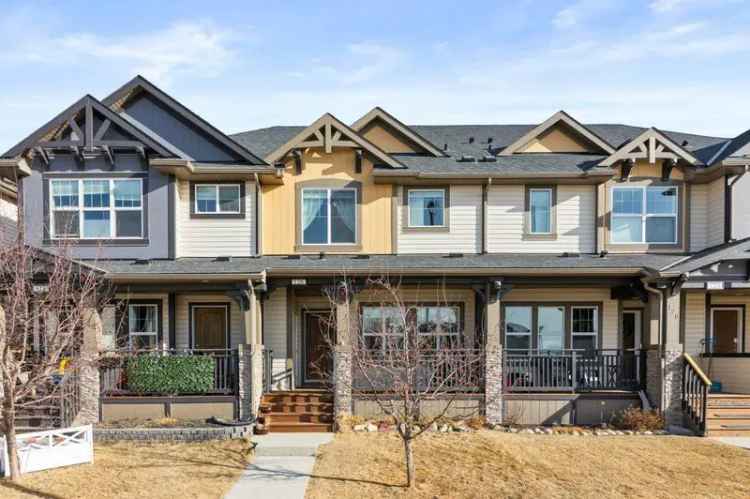 Buy townhome in Cochrane with 4 bedrooms and no condo fees