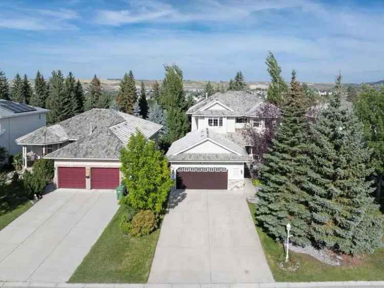 Buy Spacious Family Home in Cochrane with Open Concept and Green Space