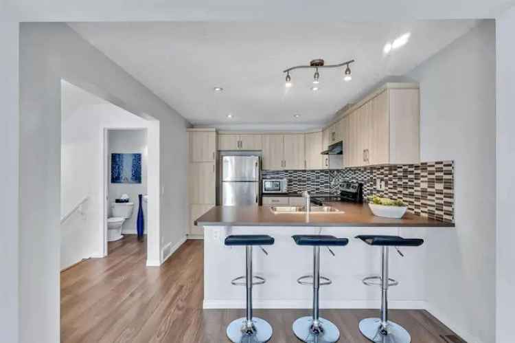 Beautifully Upgraded Townhome with No Condo Fees