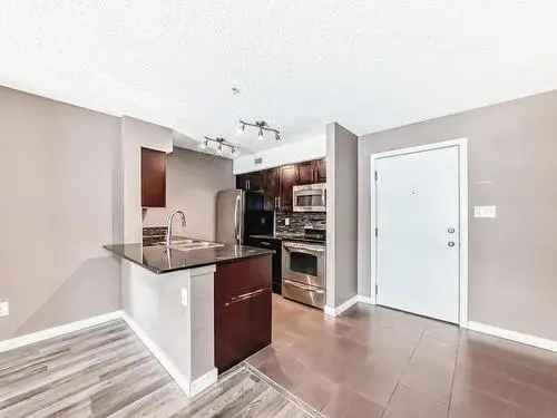 Buy Condo in McConachie Edmonton Featuring 2 Bedrooms and Private Patio