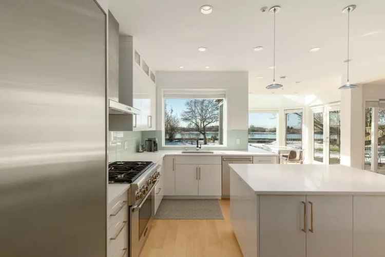 Riverfront Home on Deering Island: Stunning Sunsets, City Views, & Luxury Amenities