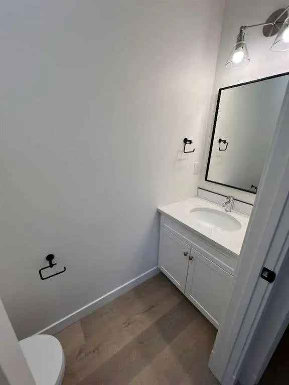 2-Storey Kensington Home with Legal Suite and Triple Garage