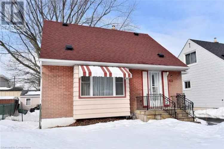 Buy House in Family-Friendly Neighbourhood with Spacious Kitchen and Patio