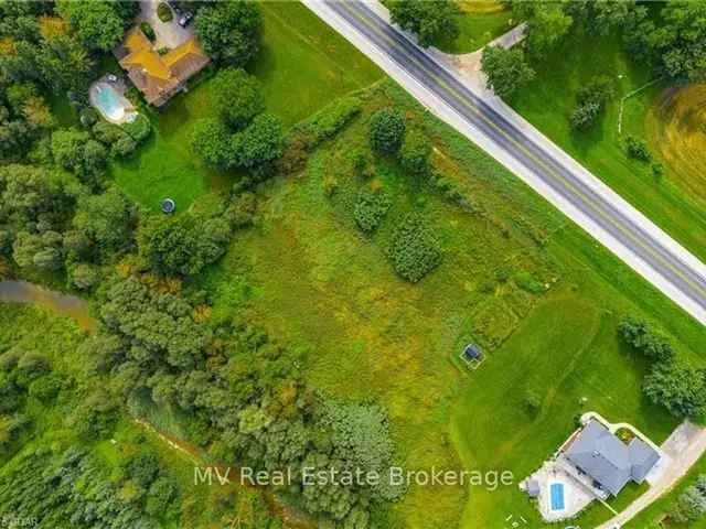 1.28 Acre Lot for Dream Home - Approved Setbacks, Peaceful Retreat