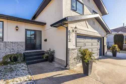 Buy House in North Mission Crawford Kelowna with Renovated Kitchen and Garden