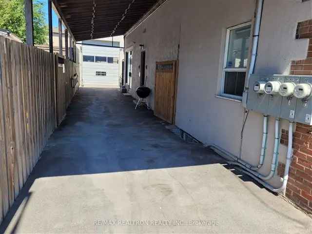 High Exposure Commercial Storefront 2 Apartments Oversized Garage