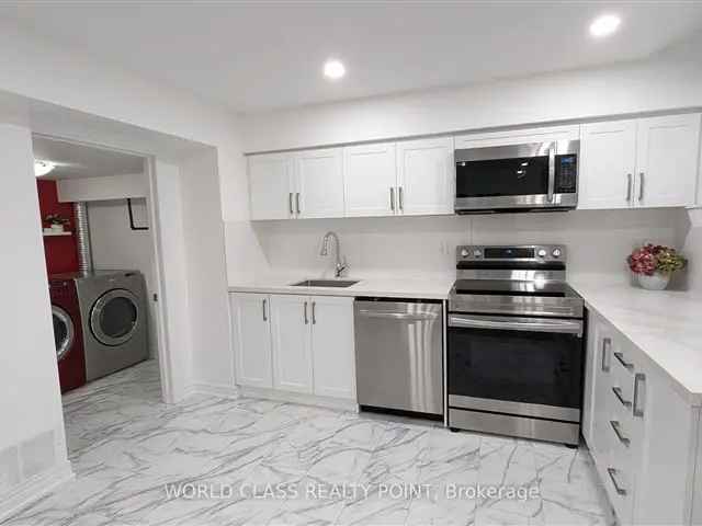 Bright 2 Bedroom Basement Apartment Modern Kitchen Quartz Countertops