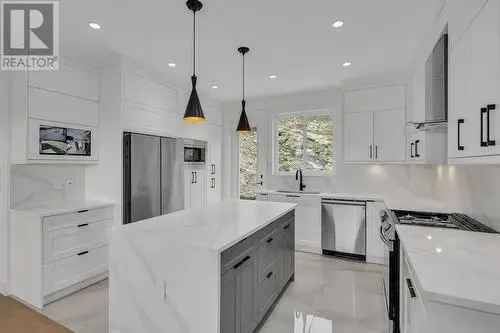 4-Bed 4-Bath Home with Mortgage Helper Suite in Smith Creek